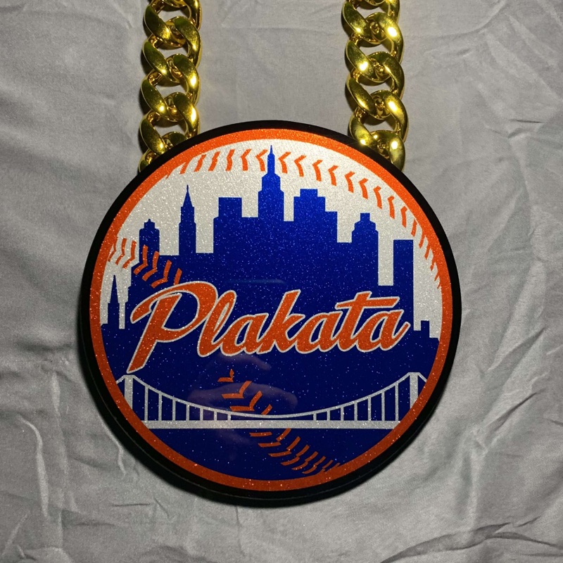 Round Plakata baseball pendant on a gold chain
