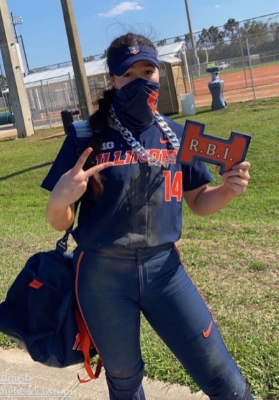 Illinois softball player wearing a custom RBI celebration chain